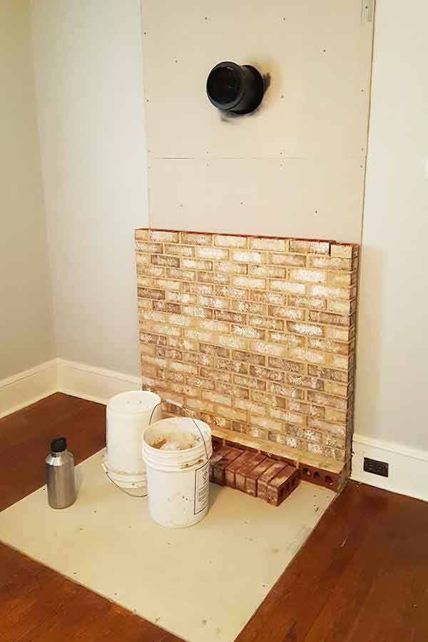 Prep work before free-standing stove installation brick and mortar