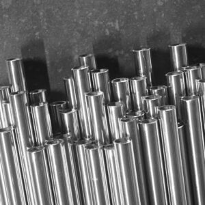 a pile of stainless steel poles